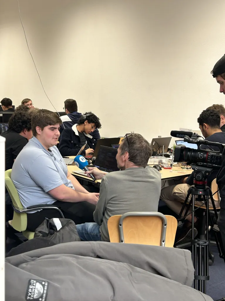 Students being interviewed by Dutch local news about the exchange